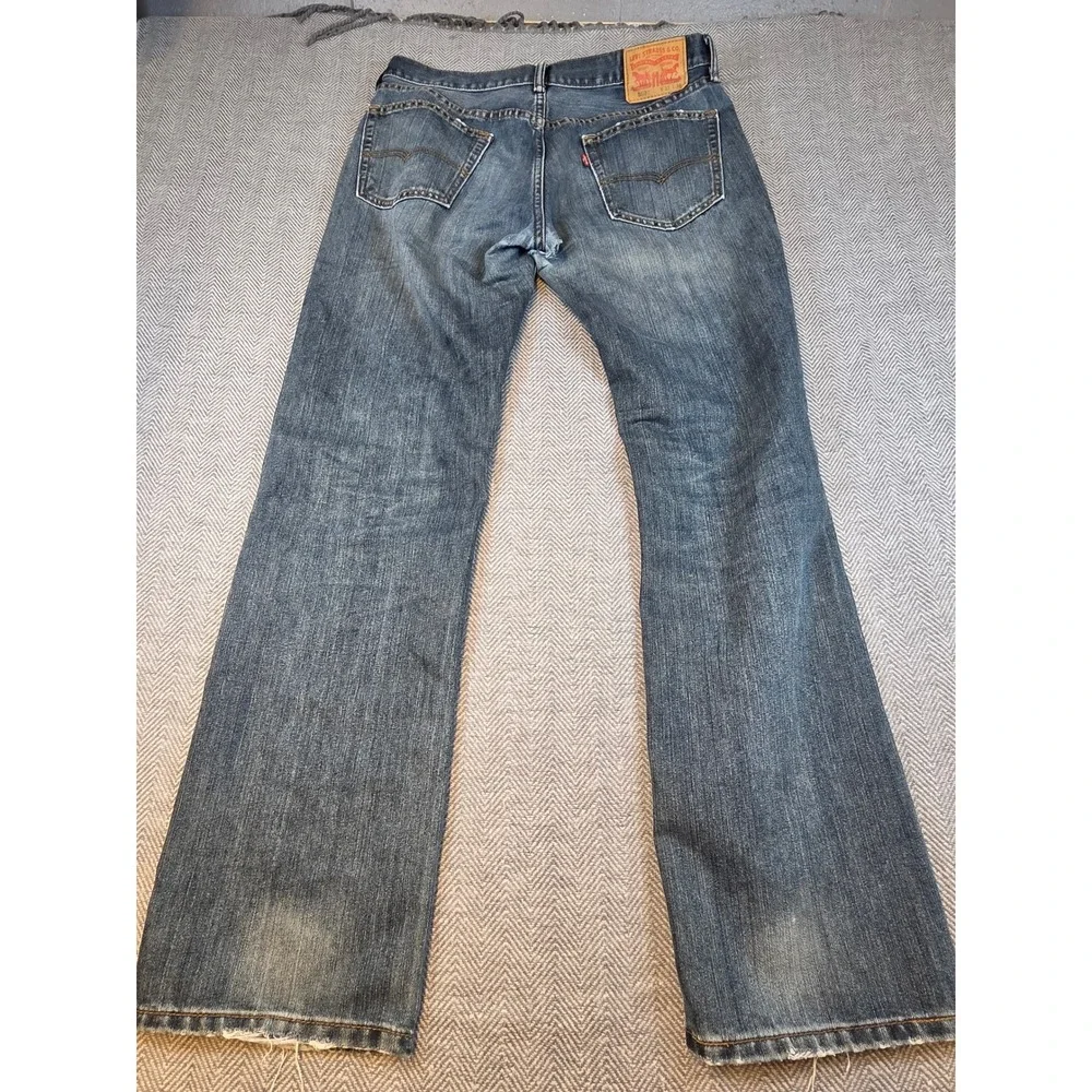 Levis 559 Relaxed Straight Jeans Mens 33x34 Medium Wash Blue Distressed Thrashed